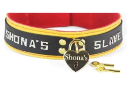 Double strap collar 1.5" wide. Black leather top, gold leather bottom, red suede inner lining, brass d ring, lettering, large gold heart-shaped lock* (*engraving on locks is no longer offered)