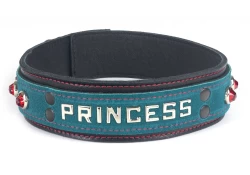 Double strap collar 1.5" wide. Teal suede outer layer top, black lambskin outer layer bottom, black leather inner lining, lettering in center, ruby dome gems.