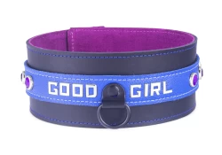 Double strap collar 2.25" wide. Ocean blue leather top strap, black leather bottom strap, violet suede inner lining, black d ring with clamp in center, lettering and amethyst gems.