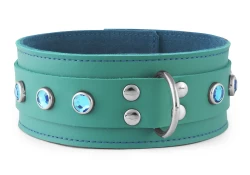 Double strap collar 2" wide. Dark teal leather* top, dark teal leather bottom, teal suede inner lining, d ring, aquamarine gems. * Material is discontinued.