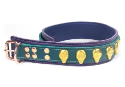 Double strap collar 1.5" wide. Teal lambskin outer layer top, purple lambskin outer layer bottom, purple lambskin inner lining, brass skulls, rose-gold d ring, rose-gold buckle.