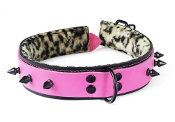 Double strap collar 1.25" wide. Pink leather top, black leather bottom, leopard fur inner lining, black d ring, black spikes.