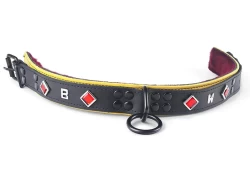 Heavy duty collar 1.25" wide. Black leather top, gold leather bottom, burgundy fur inner lining reinforced black loop & dee in center. Ruby diamond gems (with letters in between).