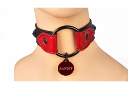 1.75" wide O-ring collar with wings. Black leather, red lambskin inner lining`