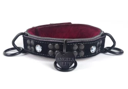 Heavy duty collar 1.25" wide. Black suede outer layer top, grey leather bottom, burgundy fur inner lining, reinforced black loop & dee (with large black heart custom tag), baby blue gems.