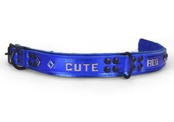 Heavy duty collar 1.25" wide. Blue metallic leather top, royal blue leather bottom, royal blue fur inner lining, reinforced black d ring in center, reinforced black d ring by buckle, lettering and sapphire mini diamond gems.