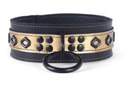 Heavy duty collar 2" wide. Gold metallic leather top, black leather bottom, black lambskin inner lining, reinforced black loop & dee, black hollow diamonds.