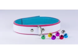 Double strap collar 1" wide, made in 3/4 top style. Whtie leather top, light red leather bottom, baby blue lambskin inner lining, silver d ring. Shows available small jingle bells that we offer,