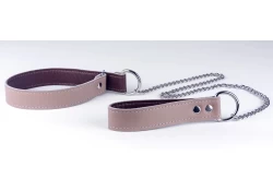 1" wide choker collar with a matching leash. Mocha leather, chocolate lambskin inner lining. Chocker collars are not compatible with decor or lettering. If you would like to order one, please email us.