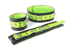 Double strap collar and cuffs, 2" wide. Lime green leather top, black leather bottom, lime green fur inner lining, crystal dome gems, d ring in center on cuffs, no attachment on collar