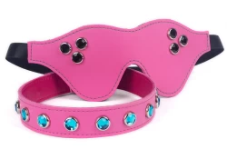 Single strap collar and blindfold made with pink leather. Aquamarine gems on the collar, onyx gems on the blindfold.