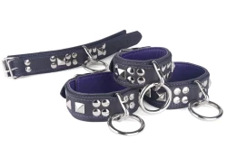Double strap wrist and ankle cuffs, all 1.25" wide. Black leather top and bottom, purple lambskin inner lining, reinforced* silver loop & dee in center, pyramids. *We no longer offer reinforced attachments on the cuffs (there is just no enough space for it).