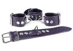 Set of wrist and ankle cuffs 1.75' wide. Midnight Purple leather, black lambskin inner lining, triangle in center, opal gems