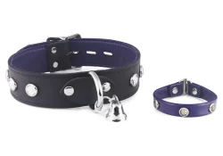 Single strap collar 1.25" wide, black leather, purple lambskin inner lining, d ring in center with small bell attached, Bracelet (always 0.5" wide) in purple lambskin, smoke gems (discontinued)