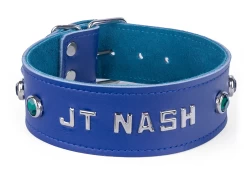 Single strap collar 1.75" wide. Royal blue leather, teal suede inner lining, lettering and emerald gems