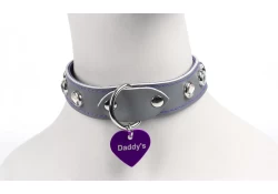 Single strap collar 1" wide. Grey leather, d ring in center (with large purple heart purple tag attached), crystal gems