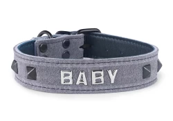 Single strap collar 1" wide. Grey suede outer layer, forest green lambskin inner lining, lettering, black pyramids, black d ring by buckle, black buckle.