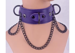 1.75" wide collar with black chains. Purple lambskin outer layer, 3 black d rings, onyx gems.