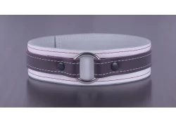 1.5" wide collar without wings. Top strap is 0.75" wide. Chocolate raspberry leather top strap, white leather bottom strap, white suede inner lining, 1" silver o-ring in center.