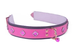 1.5" wide collar. Pink leather top, midnight purple leather bottom, baby rose cuddle fleece lining, rose-gold d ring (with small bell), pink diamond gems