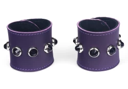 single strap cuffs, 2" wide. Grape leather, black suede inner lining, black dome gems (discontinued).