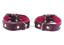 Single strap cuffs, 0.75" wide. Chocolate raspberry leather, no inner lining, d ring.