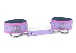 Double strap cuffs, 1.75" wide. Morning lavender leather top, rose leather bottom, teal lambskin inner lining, silver loop & dee with leather cuff link attached, opal gems.