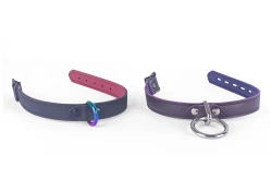 two 0.75" wide collars. Left: black leather, red lambskin inner lining, rainbow d ring, black buckle. Right: Chocolate raspberry leather, grape lambskin inner lining, loop & dee, black locking buckle.