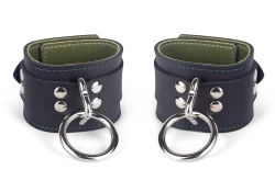 Double strap cuffs, 2" wide. Black leather top and bottom straps, olive lambskin inner lining, silver loop & dee attachment.