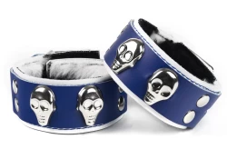 Double strap cuffs, 1.25" wide. Royal blue leather top, white leather bottom, cow fur inner lining, skulls.