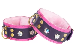 Double strap cuffs, 1.5" wide. Chocolate Raspberry leather top strap, pink leather bottom strap, pastel fur inner lining, brass d ring, opal gems