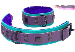 Double strap cuffs, 1.5" wide. Chocolate raspberry leather top, deal leather bottom, purple fur inner lining, black d ring, black rectangles., black locking buckle.