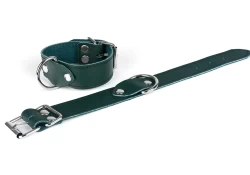Single strap cuffs, 0.75" wide. Forest green leather, no inner lining, d ring.