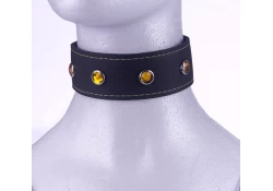 Single strap collar 1.75" wide. Black leather with gold gems