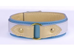 1.5" wide collar. White leather top, baby blue leather bottom, champagne lambskin inner lining (on top and bottom), brass o-ring in center.