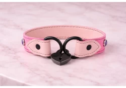 1" wide collar. pink leather, pastel lambskin inner lining, black d rings, amethyst gems, lock-8B (black heart-shaped lock).